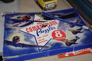 lot 1190 image: Vintage ArmyNavy Combat Plane Puzzles
