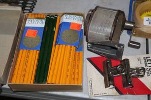 lot 1204 image: Vintage Pencil Sharpener with Drawing Pencils by Venus 4H, Pack of Steel Letter Clips