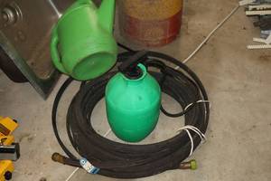 lot 1282 image: Pump Sprayer, Garden Hose and Watering Can