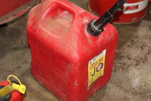 lot 1384 image: 5-Gallon Plastic Gasoline Can