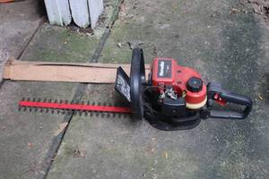 lot 1415 image: Homelite 17-blade Gas Hedge Trimmer