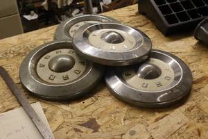 lot 1456 image: Lot of (4) Vintage Ford Hub Caps
