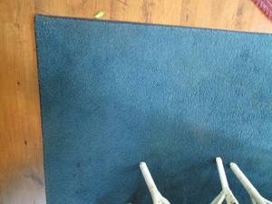lot 109 image: 68 Blue area rug (could use a l...
