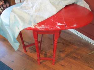 lot 115 image: Round Red painted wood drop leaf di...