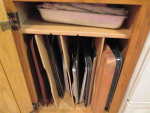 lot 131 image: Large lot of cookie sheets, cake pa...