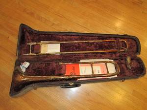 lot 2 image: Antique Trombone in velour lined co...
