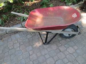 lot 89 image: Metal bucket wood handle wheelbarro...