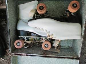 lot 67 image: Vintage wood wheeled roller skates ...