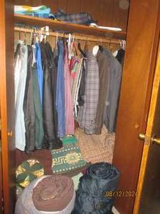lot 402 image: Contents of office closet. Mens sui...
