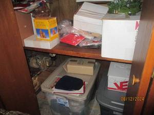 lot 409 image: Bottom shelf and contents from left...