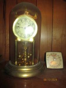 lot 412 image: Clock and thermometer...