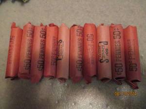 lot 451 image: 10 - 50 cent rolls of pennies. As f...