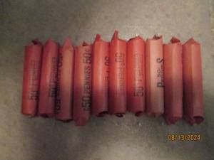 lot 452 image: 10 - 50 cent rolls of pennies. As f...