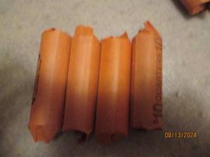 lot 464 image: 4 - 10 dollar rolls of quarters. As...