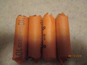 lot 466 image: 4 - 10 dollar rolls of quarters. As...