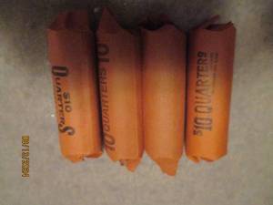 lot 467 image: 4 - 10 dollar rolls of quarters. As...