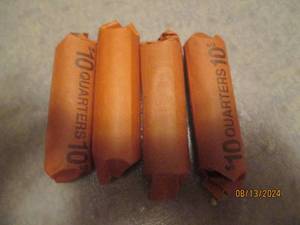 lot 469 image: 4 - 10 dollar rolls of quarters. As...