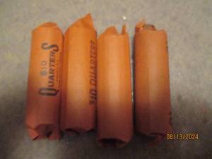 lot 472 image: 4 - 10 dollar rolls of quarters. As...