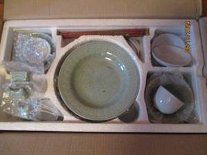 lot 232 image: Celedon dinnerware set...