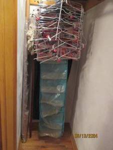 lot 243 image: Contents of corner closet, storage ...