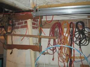 lot 506 image: Items hanging in garage cords, shel...