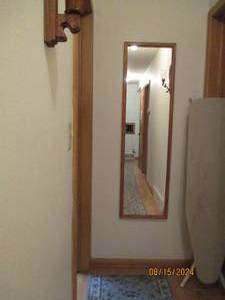 lot 552 image: Mirror, 2 wall sconces from hallway...