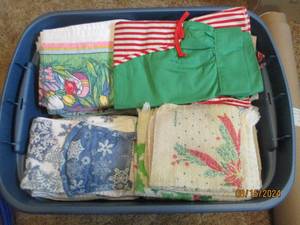 lot 560 image: Towels and potholders for almost an...