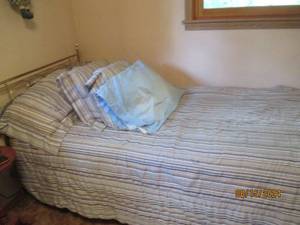 lot 5 image: Twin bed, pillows and bedding. Buye...
