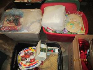 lot 572 image: Massive lot of holiday items and decor including Christmas, Halloween, Easter and more. 9 totes full. See photos