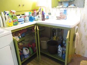 lot 300 image: All content on countertop and in lo...