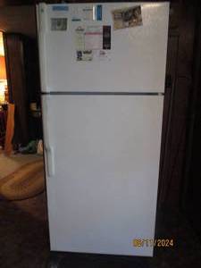 lot 309 image: GE refrigerator and top section fre...
