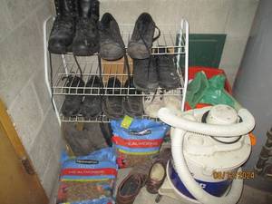 lot 370 image: Corner contents behind the door of utility room including mens shoes and shop vac