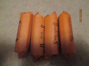 lot 470 image: 4 - 10 dollar rolls of quarters. As...