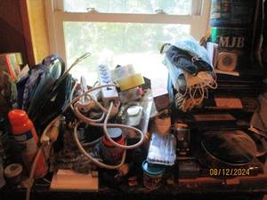 lot 380 image: Contents on top of dresser in storage room