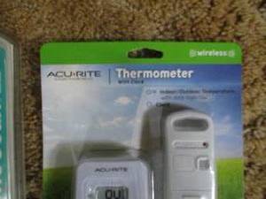 lot 568 image: Outdoor digital thermometer and ear thermometer. Both new