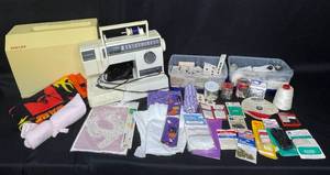 Singer Sewing Machine with Accessories and Supplies Lot