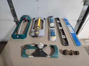 Lot of Various Sprinklers, Level, Rope and Other Garage Items