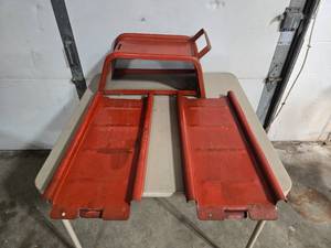 Red Metal Car Ramps. Missing one block