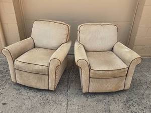 Pair of Beige Upholstered Swivel Chairs