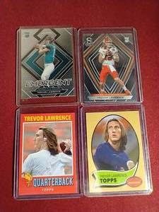 lot 59 image: (4) Trevor Lawrence Rookie Cards