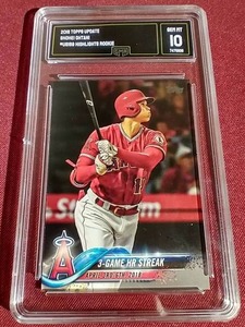 lot 63 image: 2018 Topps Update Shohei Ohtani Highlights Rookie Card - GMA 10