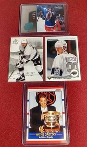 lot 102 image: (4) Wayne Gretzky Cards