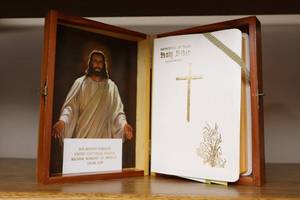lot 56 image: Collectible Wood-Encased Bible