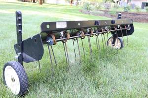 lot 92 image: Lawn & Garden ToolsSears Craftsman 40-Inch Pull Behind Tine De-Thatche