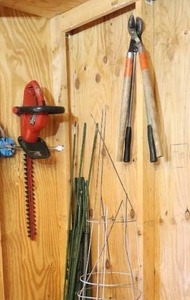 lot 66 image: Lawn & Garden Tools Etc. Craftsman 22-Inch Trimmer, Tomato Cages, Metal Fence Posts Etc