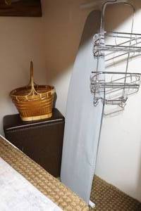 lot 299 image: Laundry Room AccessoriesIroning Board, Vintage Laundry Hamper Etc