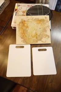 lot 305 image: Kitchen AccessoriesNorpro Seasoned Stone, Cooling Racks, Cutting Boards Etc