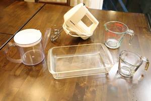 lot 311 image: Kitchen AccessoriesHamilton Beach Hand Mixer, Pyrex Glass Measuring Cup, 4-Cup Strainer Pitcher Etc