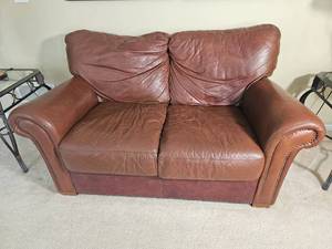 lot 17 image: Handsome Leather Mart Brown Leather Tac Rolled Arm Loveseat