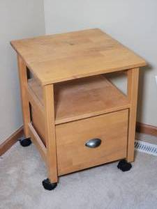 lot 115 image: Chic Modern Blonde Side Table on Rolling Casters